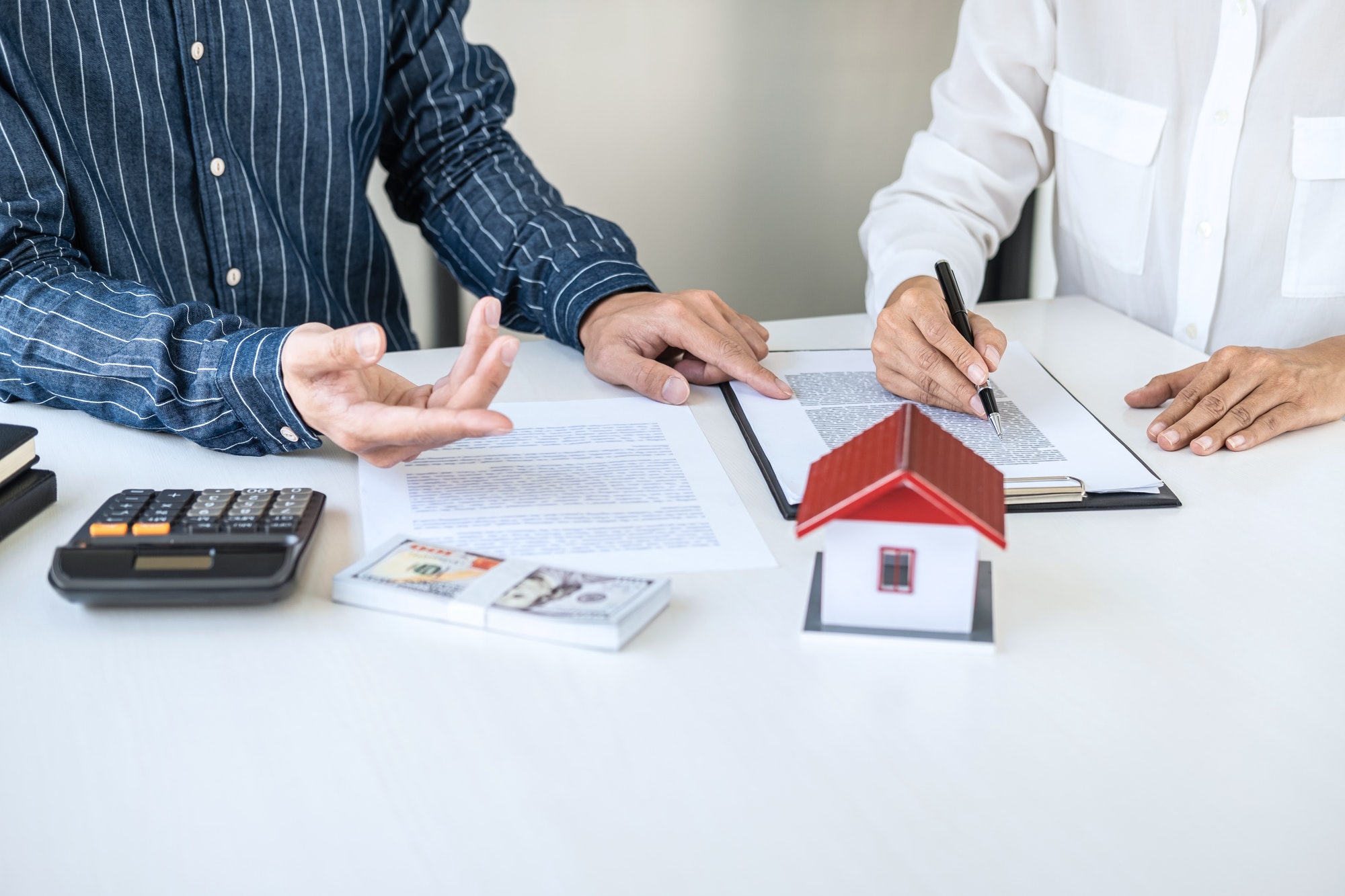 real estate broker agent being analysis and making the decision a home estate loan to customer 1